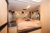 Bett im Truck Camper Slide-out